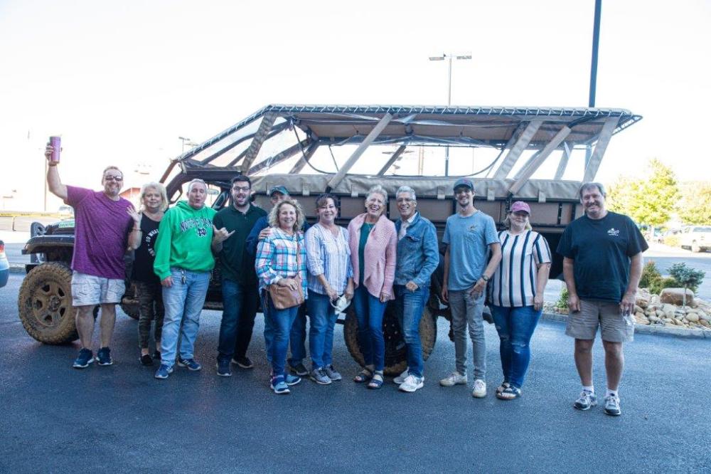 a group of people posing for the camera