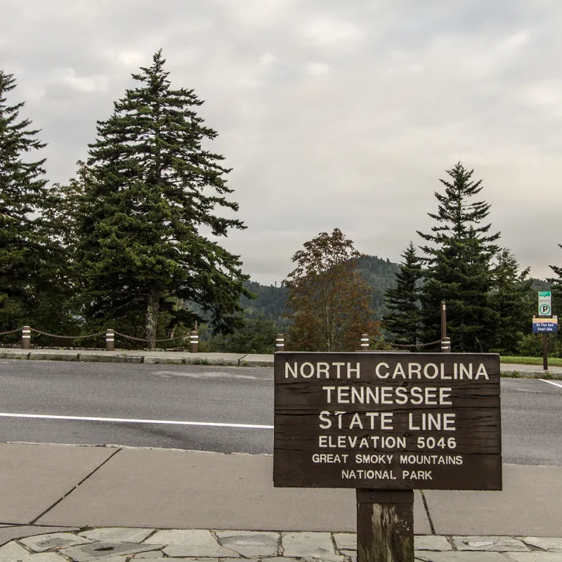 North Carolina And Tennessee State Line On The Newfound Gap Road.
