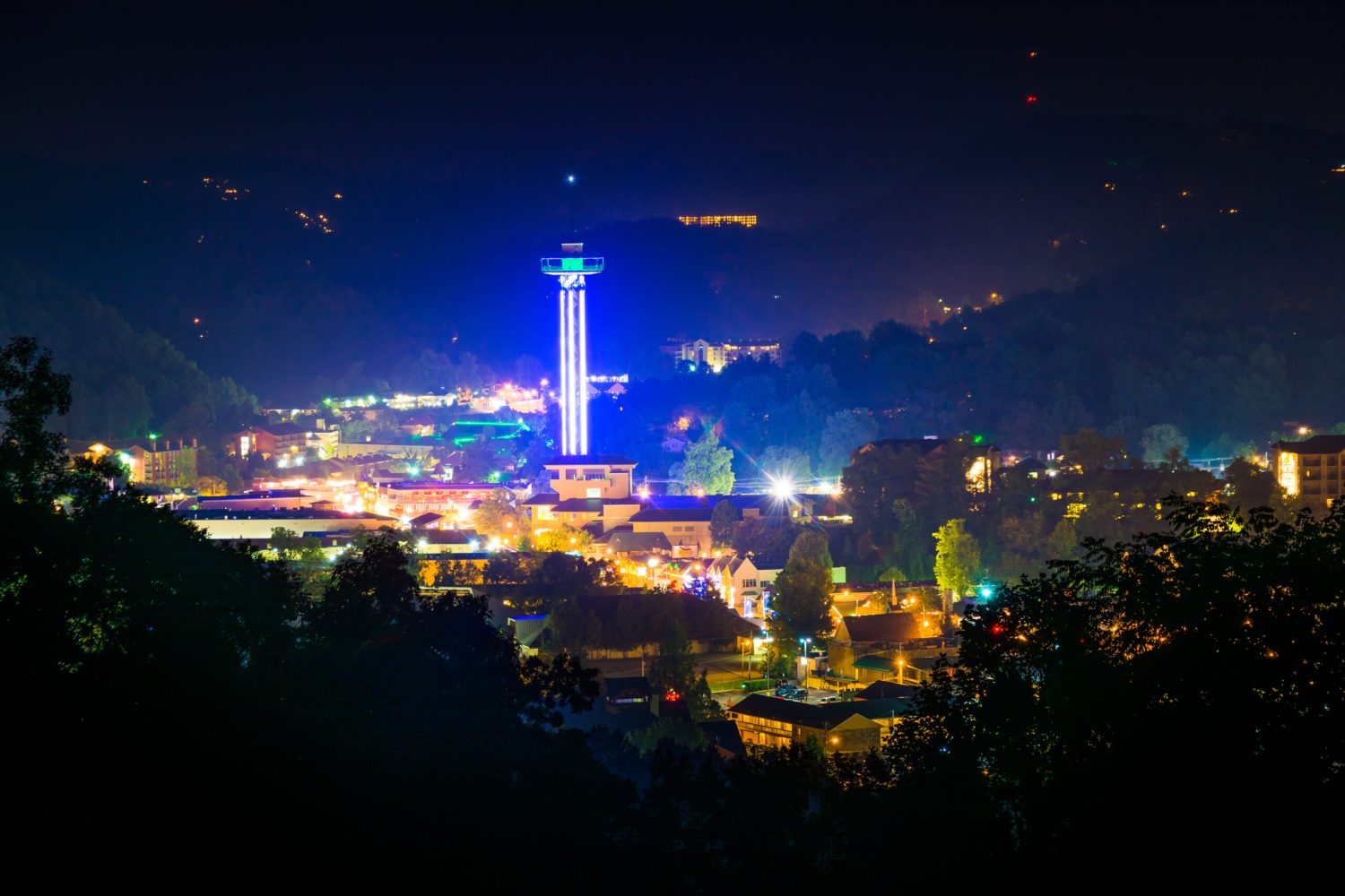 View of Gatlinburg at night, seen from Foothills Parkway in Great Smoky Mountains National Park, Tennessee.